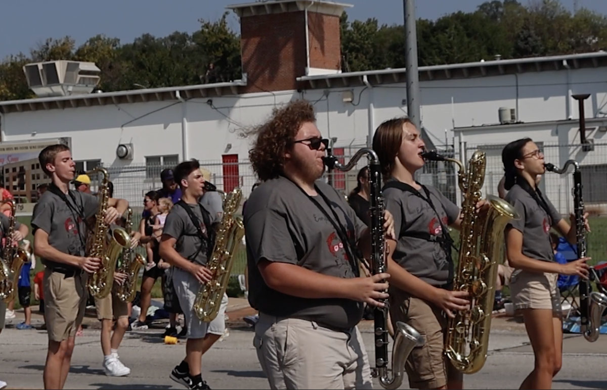 Bellevue West marching band performs at the Arrows to Aerospace Parade. 